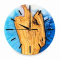 Amber Island Olive Wood & Resin Wall Clock in blue and white on a white background