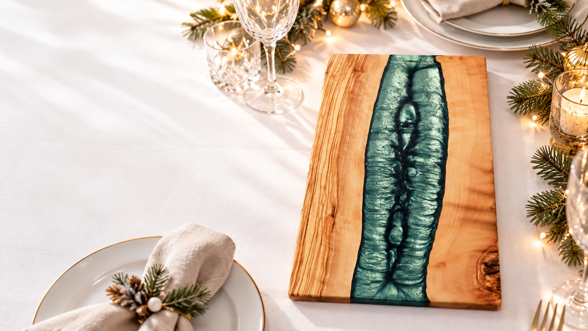 ArtWoodLab emerald resin river olive wood serving board in a styled holiday table setting