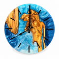 Blue Coastline Olive Wood & Resin Wall Clock in blue and white on a white background