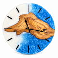 Blue Driftwood Olive Wood & Resin Wall Clock in blue and white on a white background