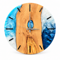 Blue Keyhole Olive Wood & Resin Wall Clock in blue and white on a white background