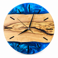 Blue Latitude Olive Wood & Resin Wall Clock in blue resin on a white background