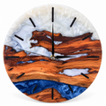 Copper Coast Wood & Resin Wall Clock in blue and white on a white background