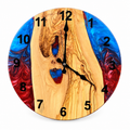 Crimson Inlet Olive Wood & Resin Wall Clock in blue and burgundy on a white background