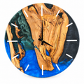Electric Night Olive Wood & Resin Wall Clock in blue and charcoal on a white background