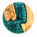 Emerald Shores Olive Wood & Resin Wall Clock in emerald green on a white background