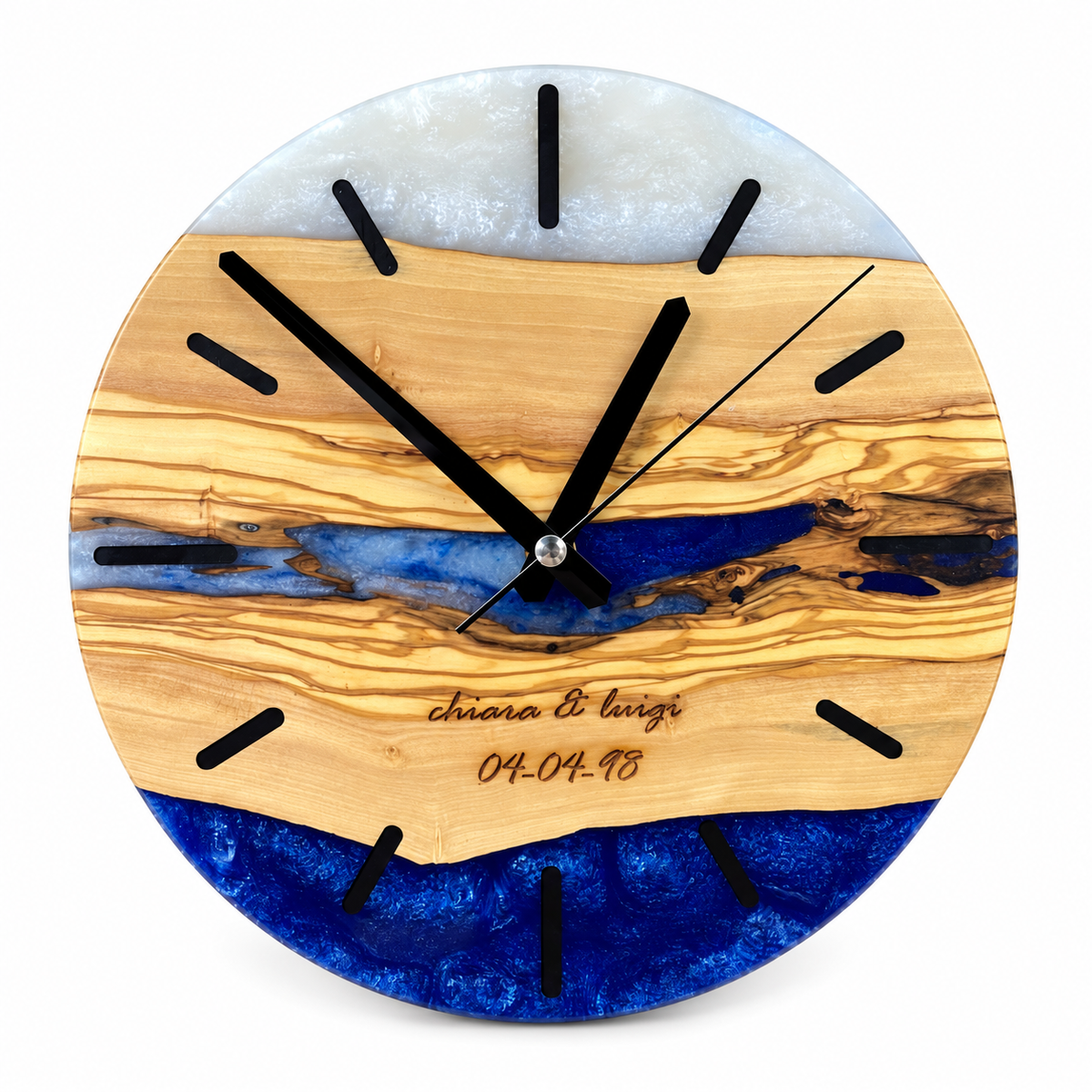 Engraved Tide Olive Wood & Resin Wall Clock in blue and white on a white background