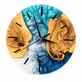 Lagoon Islands Olive Wood & Resin Wall Clock in turquoise, navy and white on a white background