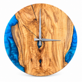 Natural Blue Rim Olive Wood & Resin Wall Clock in blue resin on a white background