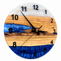 Ocean Inlay Olive Wood & Resin Wall Clock in blue and white on a white background