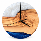 Pearl Bluff Olive Wood & Resin Wall Clock — front view on white