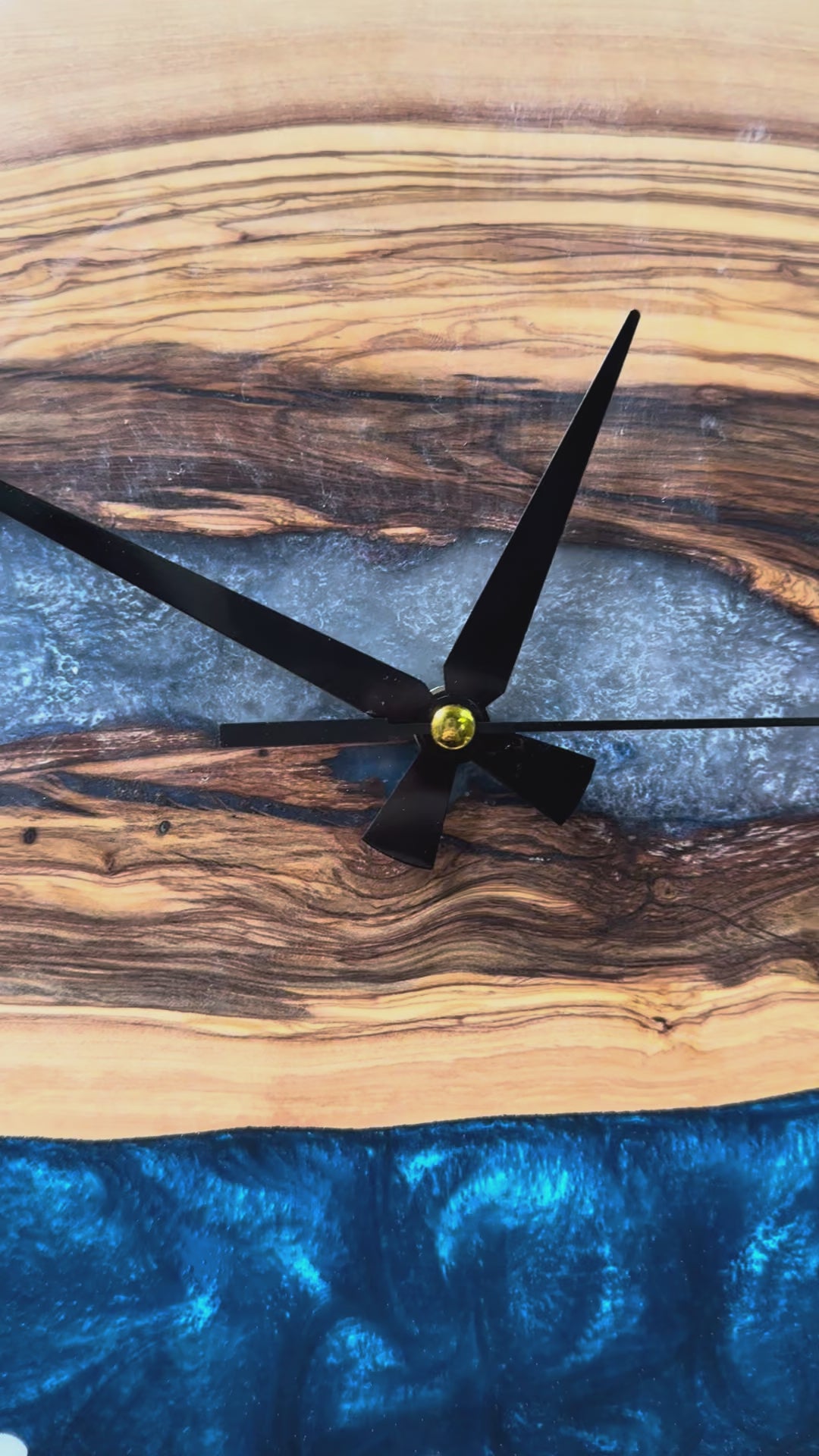 Ash Blue River Olive Wood & Resin Wall Clock — product video 15tFClXKvSgCt_T97rQ8oMEK2jPhKSH7N