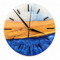 Quiet Coast Olive Wood & Resin Wall Clock in blue and pearly white on a white background