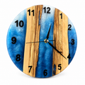 Skyline Channels Olive Wood & Resin Wall Clock in blue and white on a white background