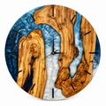 Storm Channel Olive Wood & Resin Wall Clock in slate blue and white on a white background